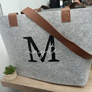 Bolso inicial y nombre